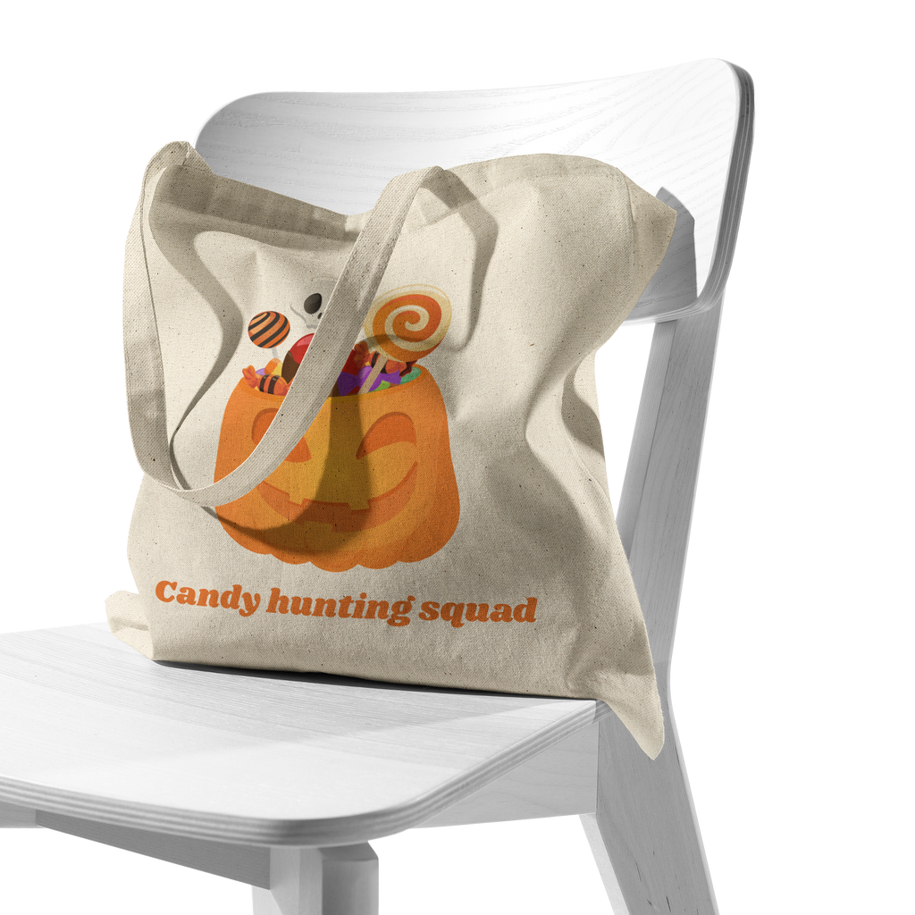 Candy_Hunting_Squad_Kids_Halloween_Tote__CottonTote_S_Chair_AS_Mockup.png