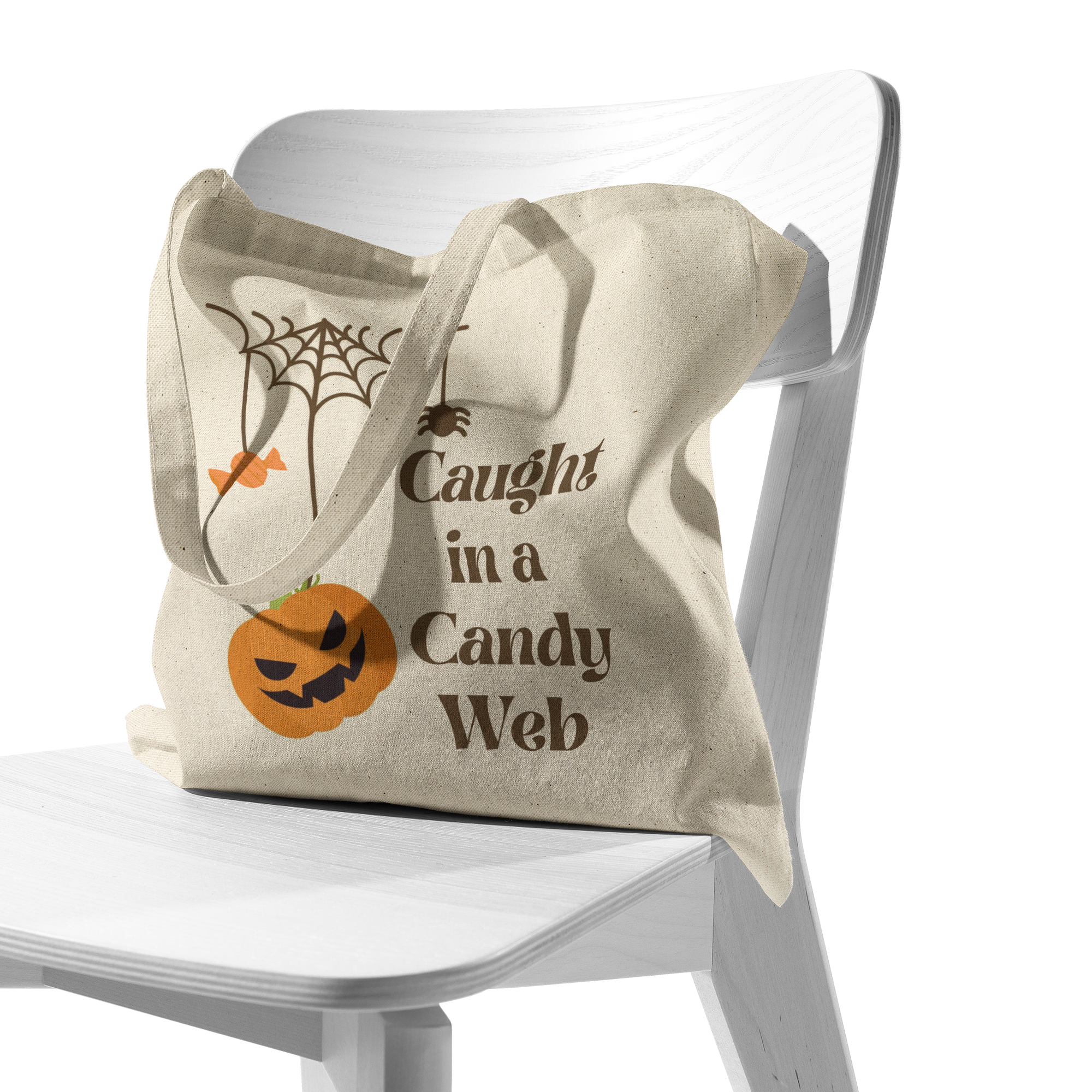 Caught_in_a_Candy_Web_Halloween_Tote_Bag_CottonTote_S_Chair_AS_Mockup.png