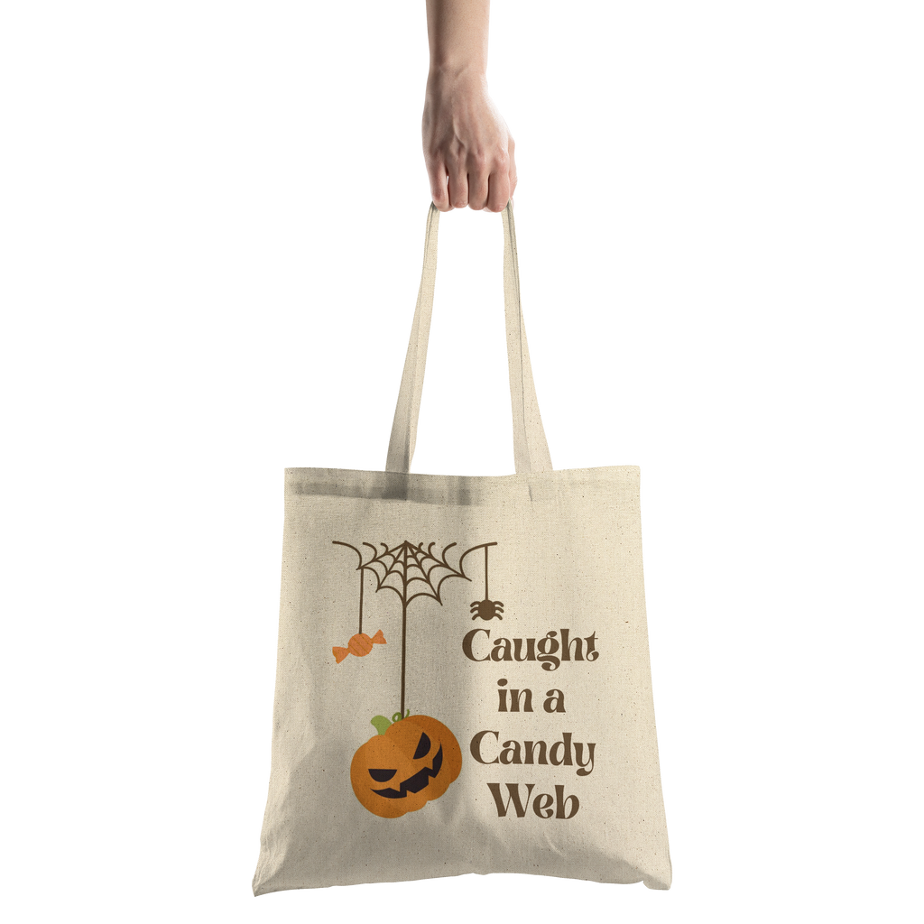Caught_in_a_Candy_Web_Halloween_Tote_Bag_CottonTote_S_HandTransparent_Mockup.png