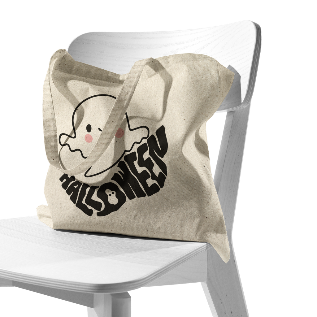 Cute_Ghostly_Halloween_Tote_CottonTote_S_Chair_AS_Mockup.png