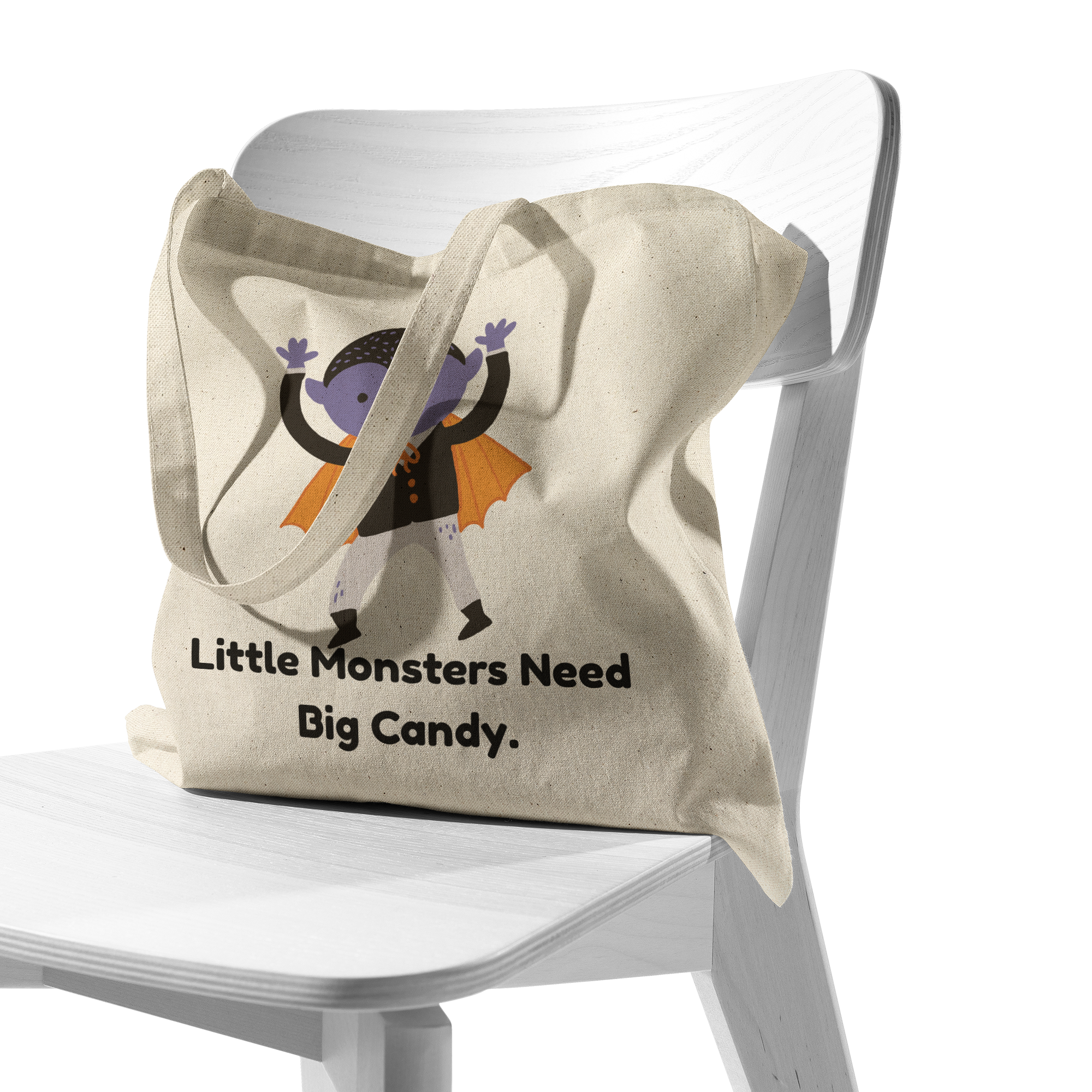 Little_Monsters_Need_Big_Candy_Tote_Bag_CottonTote_S_Chair_AS_Mockup.png